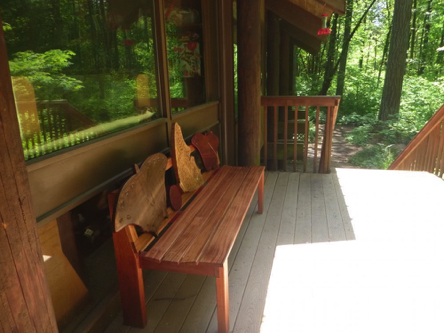 Artistic custom bench on the Nature Center deck